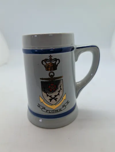 Royal Navy HMS Flora Ceramic Beer Stein with Gilt Crest