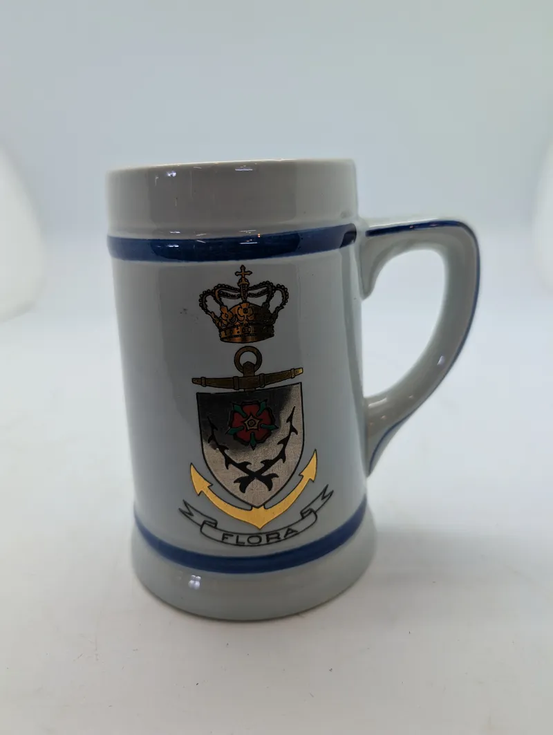 Royal Navy HMS Flora Ceramic Beer Stein with Gilt Crest