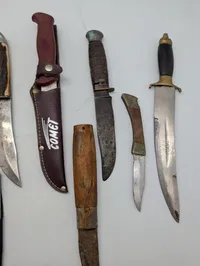 Collection of Eight Vintage Fixed Blade and Folding Knives