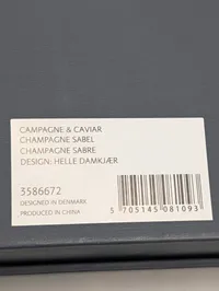 Georg Jensen Indulgence champagnesabel designet af Helle Damkjær
