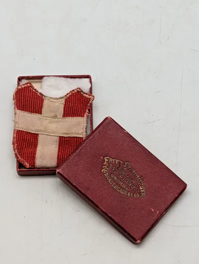 Fritz Heimbürger, Dannebrog stofmærke i original æske Frikorps Danmark ???
