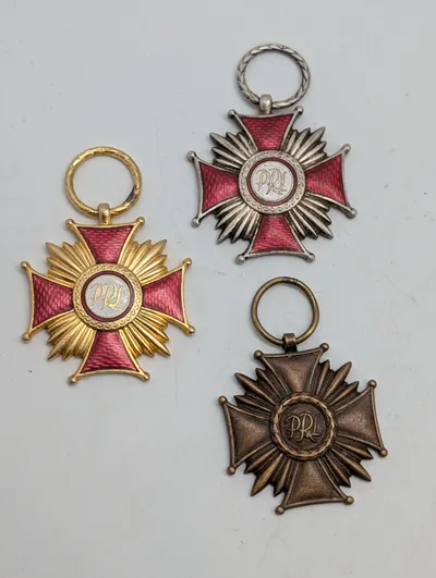 Sæt med tre polske PRL Fortjenstkors (Guld, Sølv og Bronze)