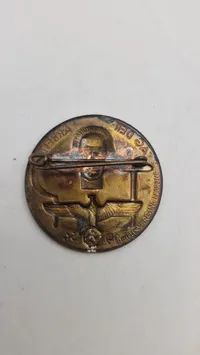1934 German Tag der Arbeit Tinnie Badge — Bronze-Finished Steel, RK Maker Mark