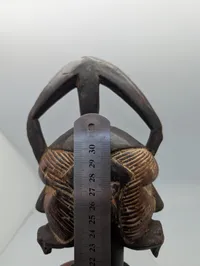 West African Hand-Carved Janus-Faced Wooden Figural Sculpture