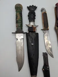 Collection of Eight Vintage Fixed Blade and Folding Knives