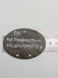 Tysk WWII Erkennungsmarke - Rgt. Stab Estn. SS Leg. (Estisk Legion)