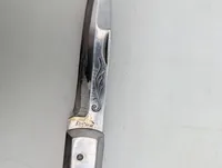 Antik europæisk foldekniv med hornskæfte og metalbeslag