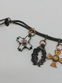 Antik miniature ordenskæde med syv europæiske ordener og medaljer