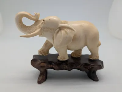Vintage Carved Faux-Ivory Elephant Figurine on Wooden Stand