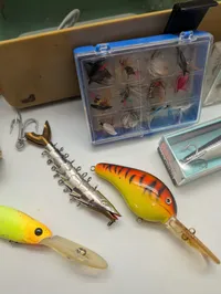 Vintage Fishing Tackle Collection with Rapala Magnum Lures and Tackle Box