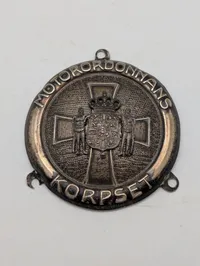 Dansk Motorordonnanskorpset køretøjsmærke i Metal