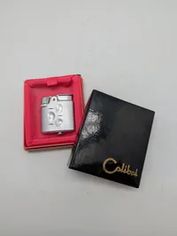 To vintage lightere fra Silver Match og Colibri