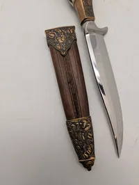 Othello Solingen jagtkniv med hjortetaksgreb og dekoreret skede